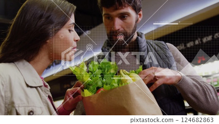 Analyzing grocery shopping data image over couple examining fresh produce in store 124682863