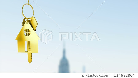 Golden house keychain image over blurred cityscape background Golden house keychain image over blurred cityscape background 124682864