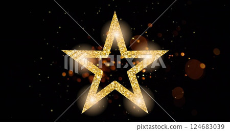 Image of light spots over golden star on black background Image of light spots over golden star on black background 124683039