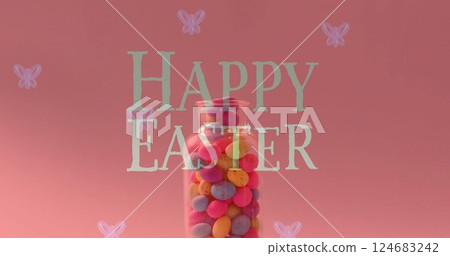 Image of happy easter text over colourful eggs in jar on pink background 124683242