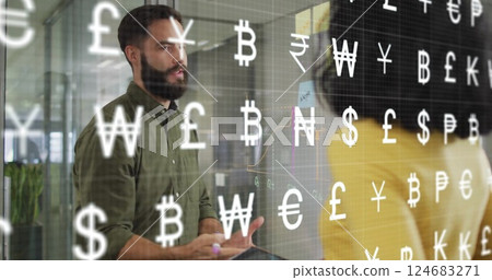Image of currency symbols over diverse colleagues discussing work in office 124683271