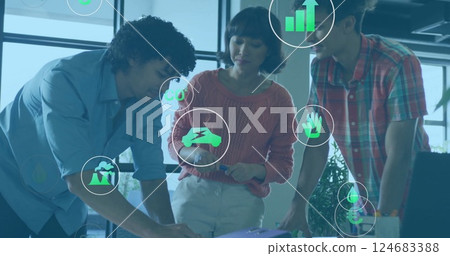 Image of ecology icons over diverse colleagues talking in office Image of ecology icons over diverse colleagues talking in office 124683388