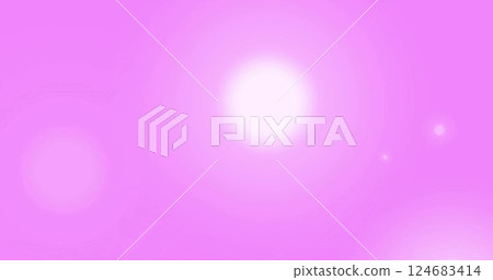 Image of glowing spots of light moving on pink background 124683414