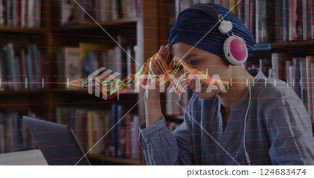 Image of diagrams over biracial female student using laptop Image of diagrams over biracial female student using laptop 124683474