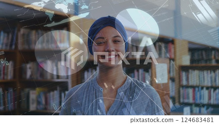 Image of diagrams and data processing over biracial female student smiling 124683481