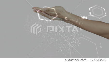 Hand holding molecular structures, image of chemical bonds and elements 124683502