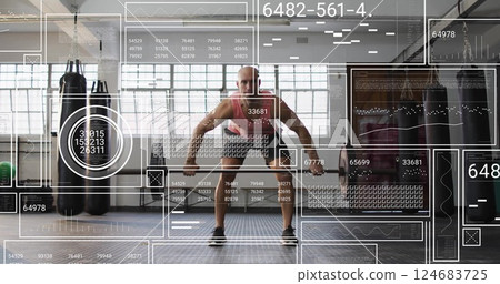 Image of diagrams and data processing over caucasian strongman lifting weight bar 124683725