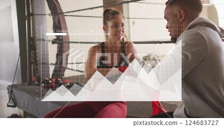 Image of diagrams and data processing over diverse couple exercising at gym Image of diagrams and data processing over diverse couple exercising at gym 124683727