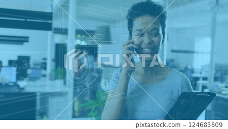 Image of financial data processing over biracial businesswoman using smartphone 124683809