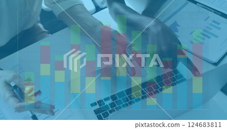 Image of financial data processing over diverse female colleagues using laptop 124683811