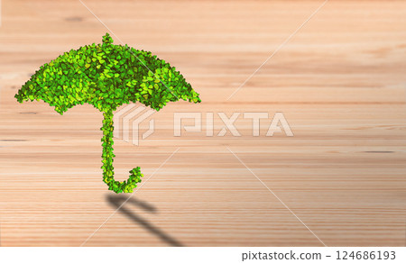 Eco-Friendly Protection: Leafy Umbrella Symbolizing Natural Shield on Wooden Background Eco-Friendly Protection: Leafy Umbrella Symbolizing Natural Shield on Wooden Background 124686193
