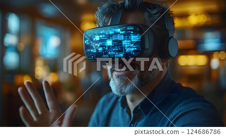 Excited businessman wearing VR goggles, using hand gestures to interact with a virtual workspace, bright setting 124686786