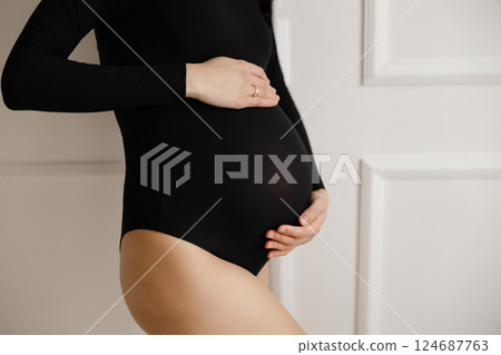 Expectant Mother Embracing Pregnancy Journey 124687763