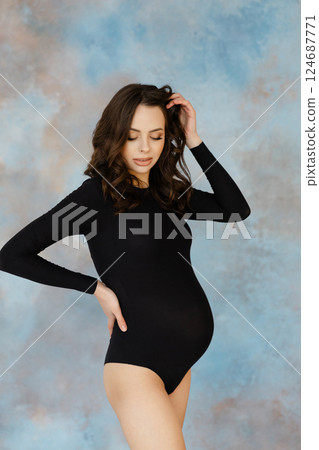 Expectant Mother Embracing Pregnancy Journey 124687771