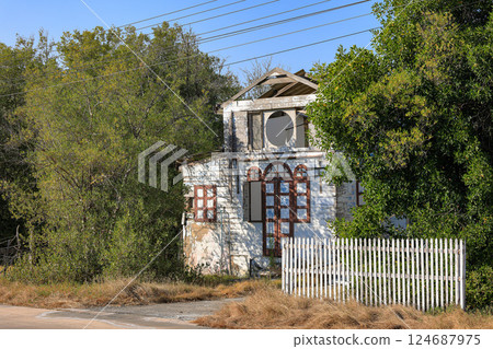 abandoned molder wooden house, derelict, weathered home at countryside. abandoned molder wooden house, derelict, weathered home at countryside. 124687975