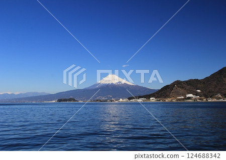 Mount Fuji in February: Clear blue lake view Mount Fuji in February: Clear blue lake view 124688342