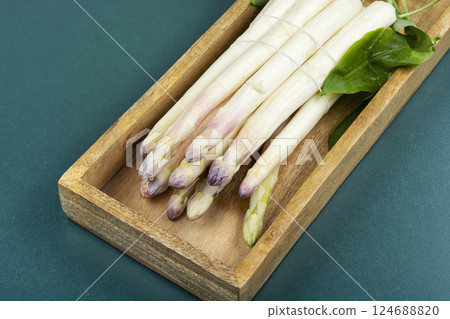 Asparagus with spices, freshly harvested white asparagus. 124688820