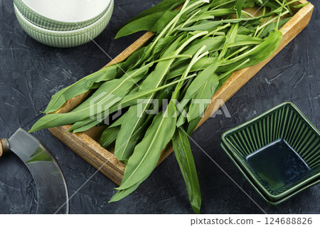 A bunch of wild onion or Ramps on the table. 124688826