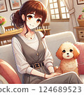 A woman holding a dog 124689523