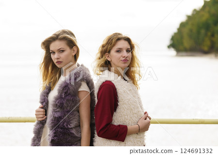 Two fashionable women outdoor 124691332