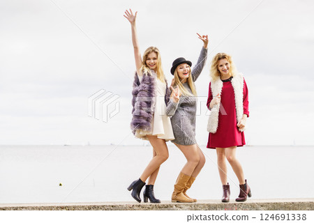 Three fashionable woman outdoor 124691338