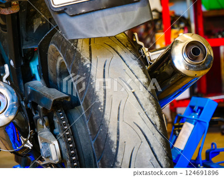Motorcycle in service repairing. Motorcycle in service repairing. 124691896