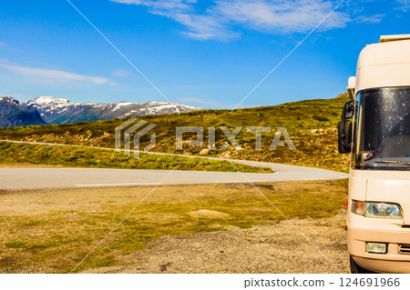 Camper car in norwegian mountains 124691966