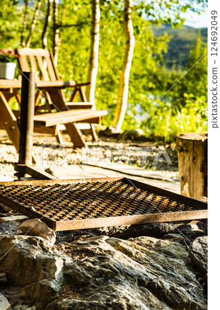 Rest stop area picnic site on fjord lake shore Rest stop area picnic site on fjord lake shore 124692049