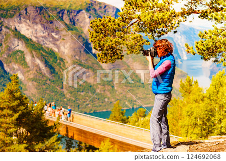 Tourist on nature take travel picture, Norway Tourist on nature take travel picture, Norway 124692068