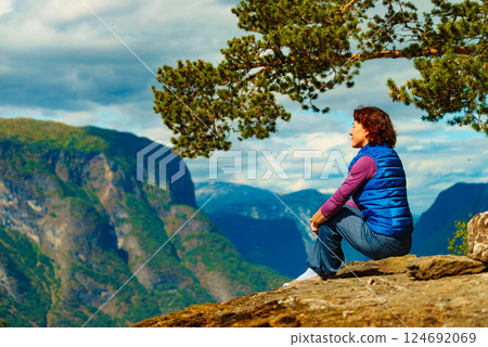 Tourist on mountains top, Norway Tourist on mountains top, Norway 124692069