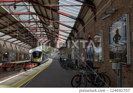 Windsor & Eton Riverside railway station with its two distinctive curved platforms and Victorian lamps. Windsor & Eton Riverside railway station with its two distinctive curved platforms and Victorian lamps. 124692707