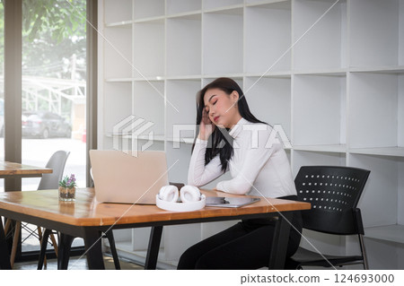 Businesswoman tired, stressed and upset with project work problem. Businesswoman tired, stressed and upset with project work problem. 124693000