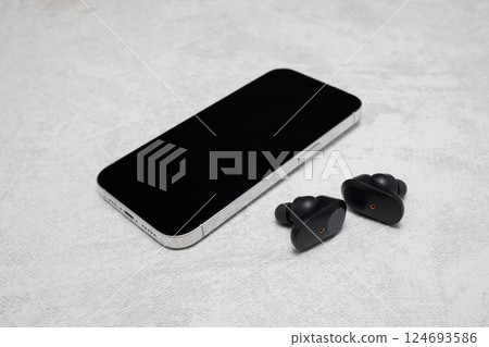 Earphones and smartphone 124693586