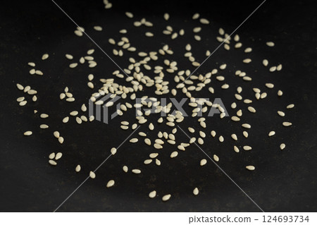 Sesame seeds, white small benne grains, Sesamum indicum fruits 124693734