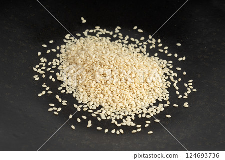 Sesame seeds, white small benne grains, Sesamum indicum fruits 124693736
