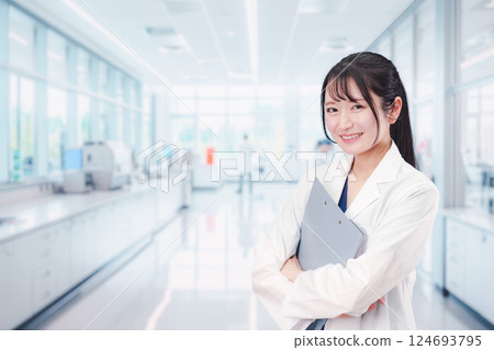 Young woman doing research in a laboratory 124693795