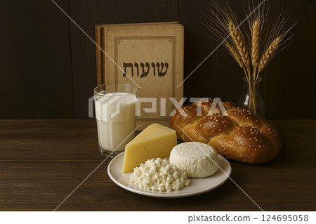 Shavuot holiday still life with challah, dairy foods, wheat and Hebrew book. AI generated 124695058