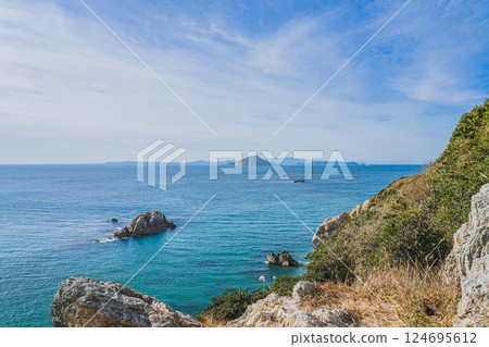 The blue sea and blue sky around Hinode Stone Gate in Tahara City (Aichi Prefecture) 124695612