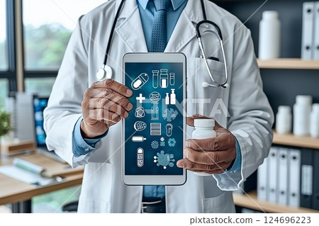 Male physician holding healthcare icons for health insurance concept in hospital setting 124696223