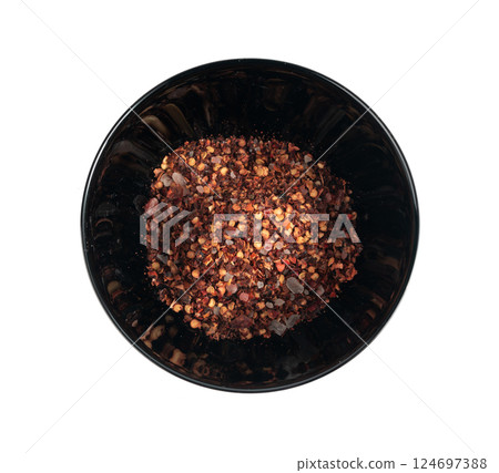 Chili and salt seasoning, red chilli pepper spice powder, dry crushed hot pepper flakes 124697388