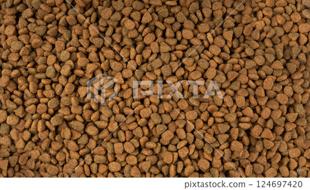 Dry pet food, dog kibble pile, puppy pellets, small canine protein croquette meal, animal food 124697420