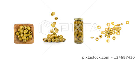 Flying Green Pickled Olives in Black Bowl. Falling Pitted Fermented Olives, Marinated Snack Flying Green Pickled Olives in Black Bowl. Falling Pitted Fermented Olives, Marinated Snack 124697430