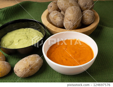 Red mojo rojo and green mojo verde sauces, traditional Tenerife dips, mojo picon dressing Red mojo rojo and green mojo verde sauces, traditional Tenerife dips, mojo picon dressing 124697576
