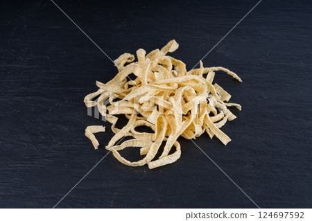 Passatelli spatzle pasta pile, raw spaetzle noodles, dry homemade german macaroni, swabian spaetzle Passatelli spatzle pasta pile, raw spaetzle noodles, dry homemade german macaroni, swabian spaetzle 124697592