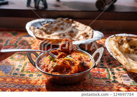 Butter paneer masala. Cottage cheese curry, hot spicy chicken korma, traditional indian food Butter paneer masala. Cottage cheese curry, hot spicy chicken korma, traditional indian food 124697784