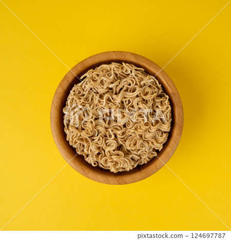 Raw Noodles, Dry Round Ramen Noodle, Uncooked Korea Vermicelli, Chinese Wheat Pasta Raw Noodles, Dry Round Ramen Noodle, Uncooked Korea Vermicelli, Chinese Wheat Pasta 124697787