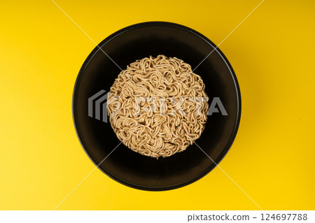 Raw Noodles, Dry Round Ramen Noodle, Uncooked Korea Vermicelli, Chinese Wheat Pasta Raw Noodles, Dry Round Ramen Noodle, Uncooked Korea Vermicelli, Chinese Wheat Pasta 124697788