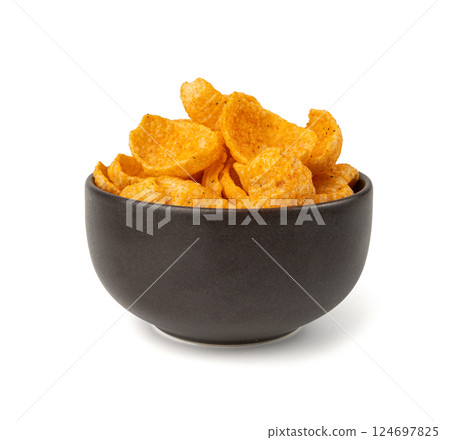 Hummus chickpea chips, chick pea crisps pile, healthy orange snack, fried legume crunchies 124697825
