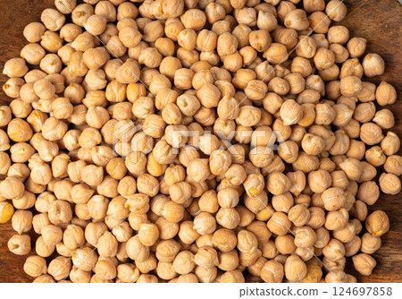 Chickpea, chick pea pile, dry Cicer arietinum fruits, raw Bengal gram legume, garbanzo beans 124697858