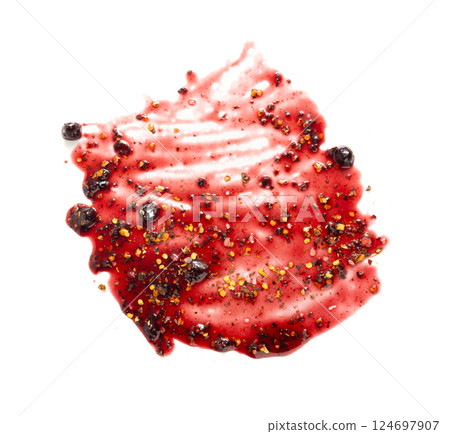 Black currant jam with chili isolated, blueberry chilli pepper marmalade smear, spicy fruit confiture 124697907